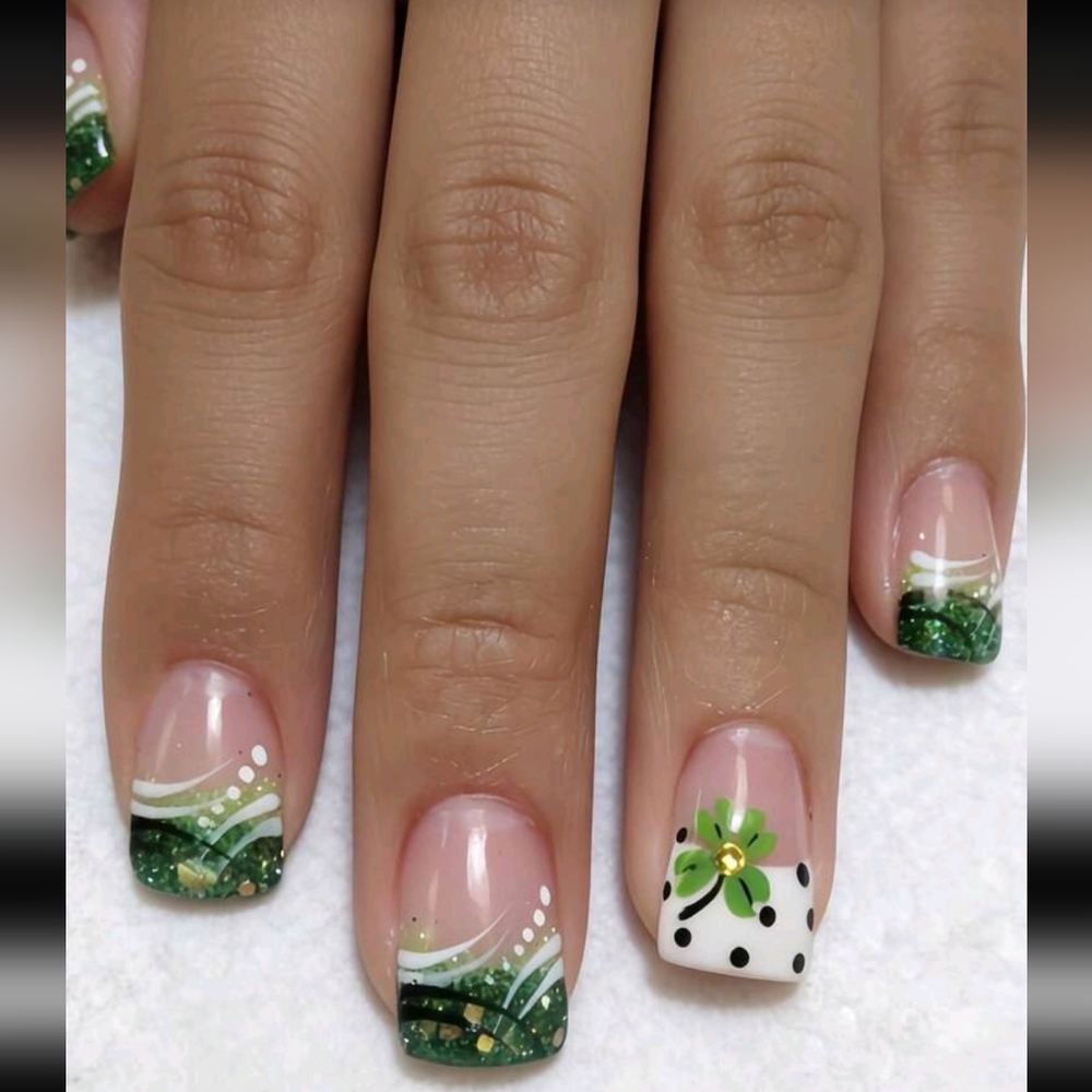Green and White Nail Art with Floral Design